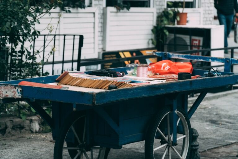 black and red cart with food packs