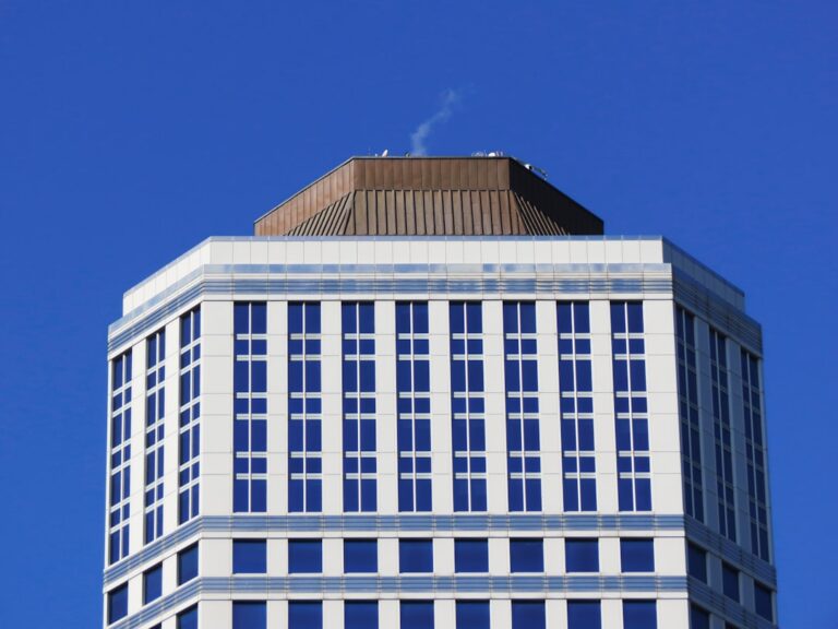white concrete building under blue sky during daytime