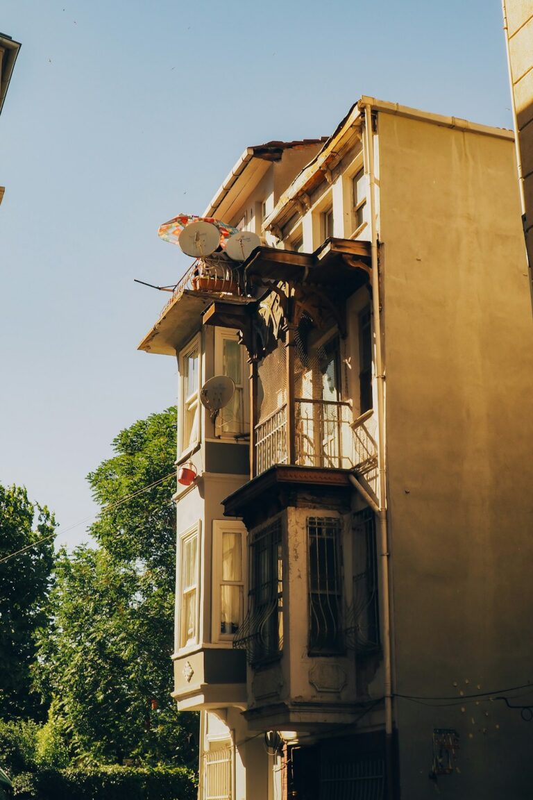 a tall building with balconies and balconies on the balconies