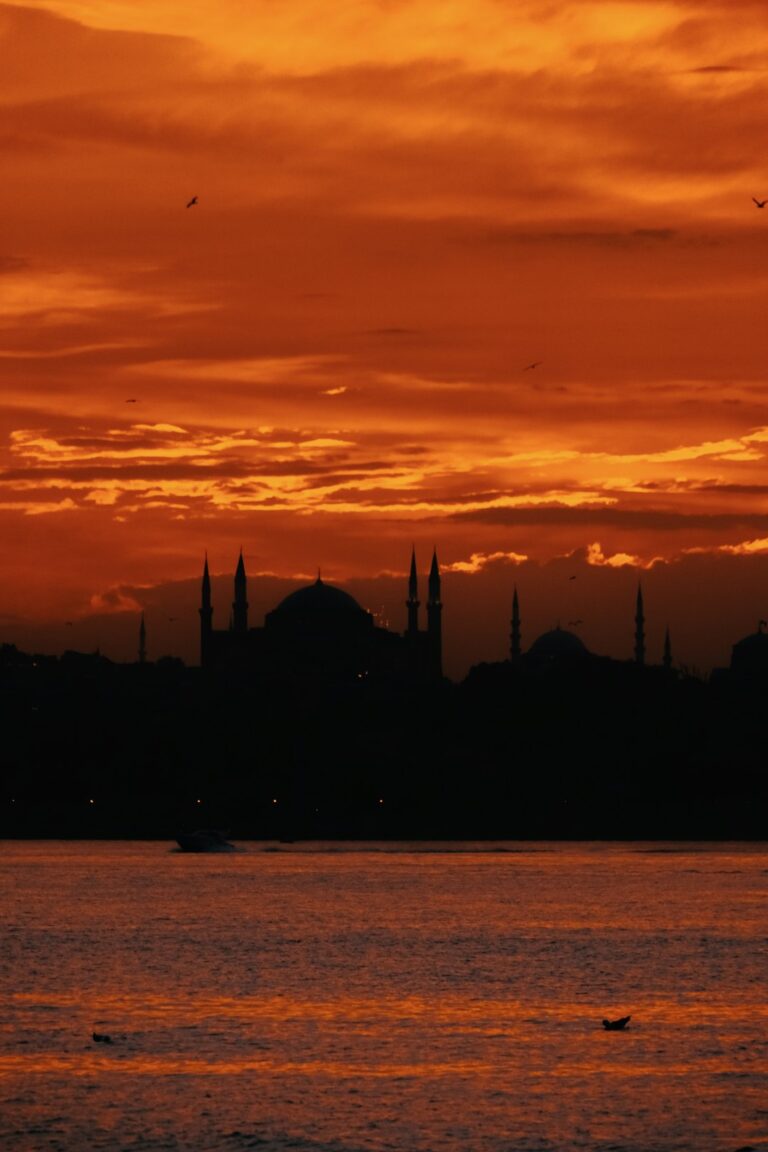 a sunset over a city