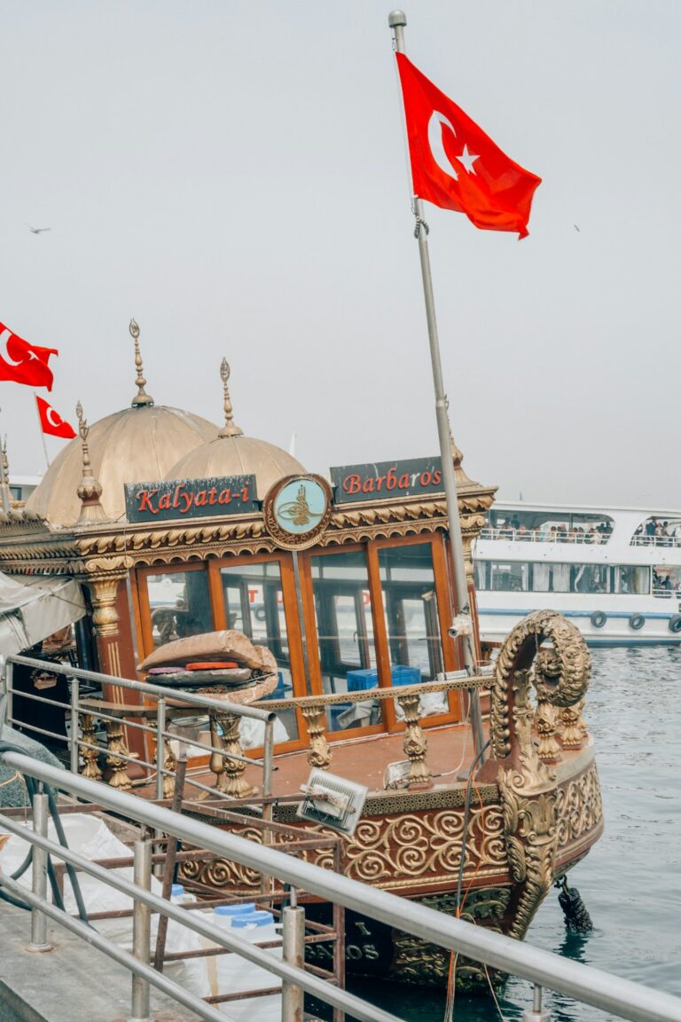 a boat with flags on it