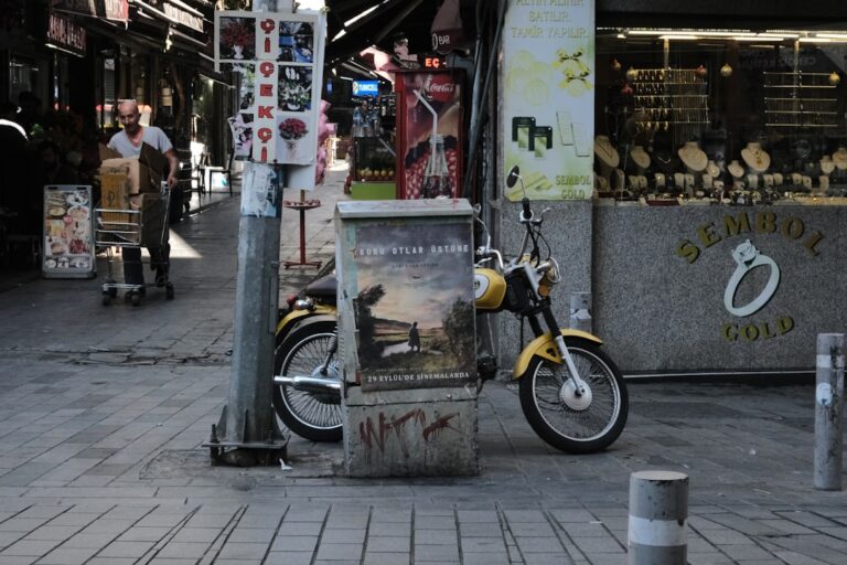 Motorcycle standing in a street.
