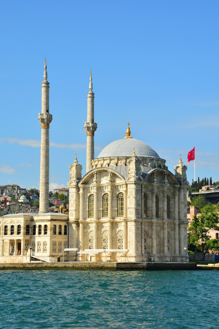 a large building sitting on top of a body of water