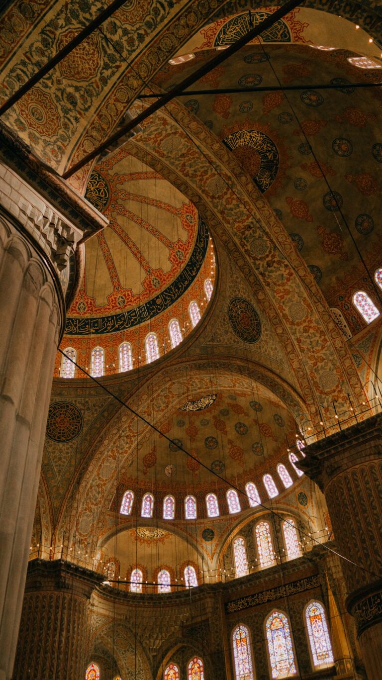 The interior of a large building with many windows